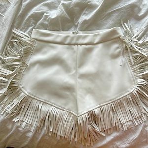 White fringe leather shorts